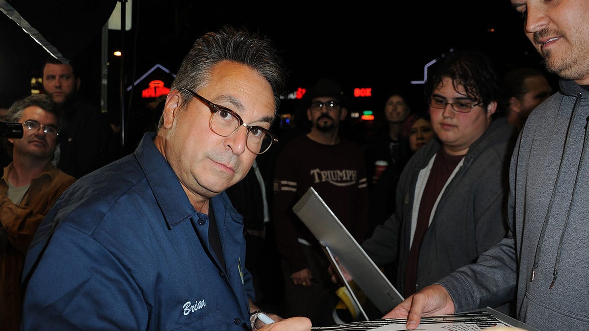 Brian Peck firmando autógrafos